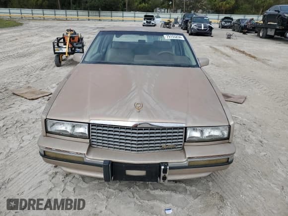 ✅ 1991 Cadillac Eldorado • VIN: 1G6EL13B4MU604636 • Lot: 79155234. Wystawiony na Copart z przebiegiem Nie podano. Bezpłatny archiwum sprzedaży aukcyjnych z USA i szczegółowy raport historii pojazdu na DreamBid. Zdjęcie 5.