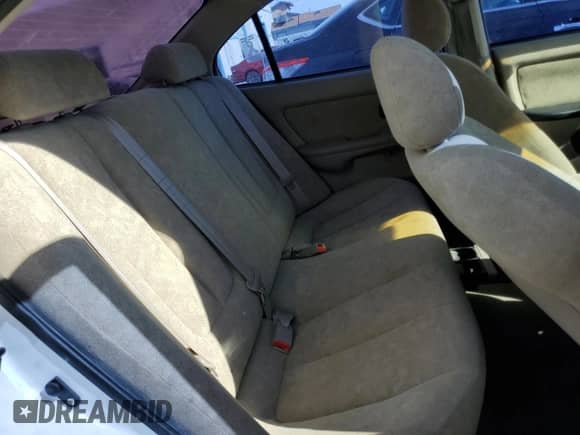 2003 Hyundai Elantra GLS z VIN KMHDN45D03U580901, wystawiony jako Copart lot #78920904 z przebiegiem 75 346 mil mil oraz Czysty tytuł • Clean title. Historia ofert i sprzedaży dostępna na DreamBid. Obrazek 10.