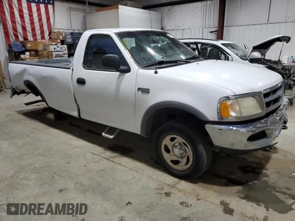 ✅ 1997 Ford F-150 • VIN: 1FTDF18W4VKD41606 • Lot: 83808524. Listed on Copart with 173,675 mi. Free auction sales archive from the USA and detailed vehicle history report at DreamBid. Image 4.