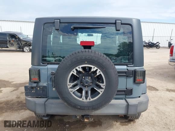✅ 2015 Jeep Wrangler Sport • VIN: 1C4AJWAG8FL723991 • Lot: 43256690. Listed on IAAI with 131,170 mi. Free auction sales archive from the USA and detailed vehicle history report at DreamBid. Image 16.