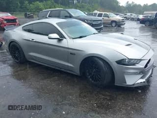 ✅ 2020 Ford Mustang GT • VIN: 1FA6P8CF3L5168801 • Lot: 42616416. Listed on IAAI with 86,594 mi. Free auction sales archive from the USA and detailed vehicle history report at DreamBid. Image 1.