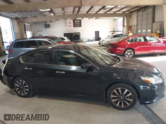 ✅ 2016 Nissan Altima SL • VIN: 1N4AL3AP1GC184534 • Лот: 42557252. Опубликован ранее на IAAI с пробегом 114 009 миль. Бесплатный доступ к архиву аукционных продаж из США и подробный отчёт об истории автомобиля на DreamBid. Изображение 13.