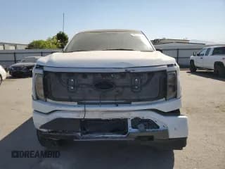 ✅ 2022 Ford F-150 Lightning Pro • VIN: 1FTVW1EV3NWG11935 • Лот: 70720274. Опубликован ранее на Copart с пробегом Не указан. Бесплатный доступ к архиву аукционных продаж из США и подробный отчёт об истории автомобиля на DreamBid. Изображение 5.