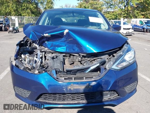✅ 2019 Nissan Sentra S • VIN: 3N1AB7AP0KY304170 • Lot: 43384524. Listed on IAAI with 140,776 mi. Free auction sales archive from the USA and detailed vehicle history report at DreamBid. Image 12.