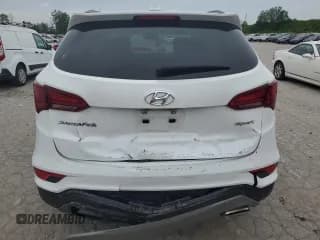 ✅ 2018 Hyundai Santa Fe 2.4L • VIN: 5NMZU3LB7JH056089 • Лот: 53609934. Опубликован ранее на Copart с пробегом 104 843 миль. Бесплатный доступ к архиву аукционных продаж из США и подробный отчёт об истории автомобиля на DreamBid. Изображение 6.