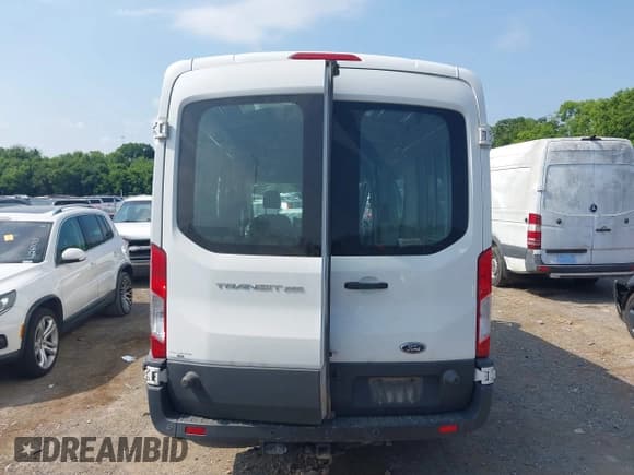✅ 2016 Ford Transit Cargo • VIN: 1FTYR2CM6GKA55411 • Lot: 42582896. Listed on IAAI with 89,921 mi. Free auction sales archive from the USA and detailed vehicle history report at DreamBid. Image 16.