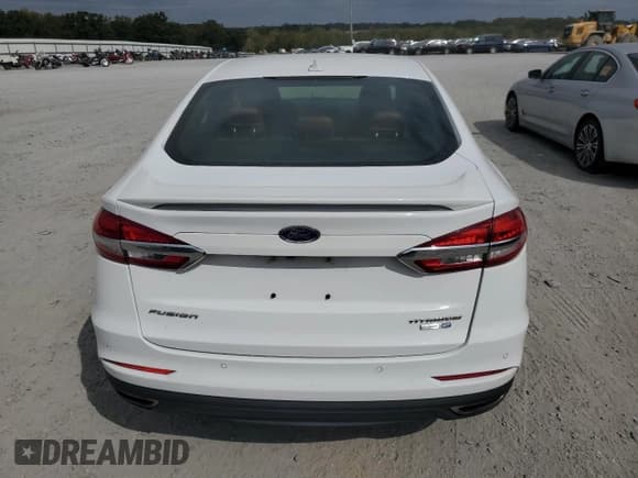 ✅ 2019 Ford Fusion Titanium • VIN: 3FA6P0D90KR152819 • Лот: 86274805. Опубликован ранее на Copart с пробегом 151 417 миль. Бесплатный доступ к архиву аукционных продаж из США и подробный отчёт об истории автомобиля на DreamBid. Изображение 6.