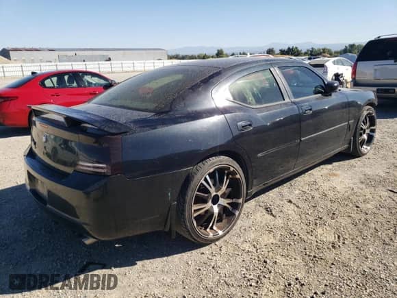 2006 Dodge Charger R/T z VIN 2B3KA53H26H398869, wystawiony jako Copart lot #73536984 z przebiegiem 152 284 mil mil oraz Szkoda całkowita • Salvage title. Historia ofert i sprzedaży dostępna na DreamBid. Obrazek 3.