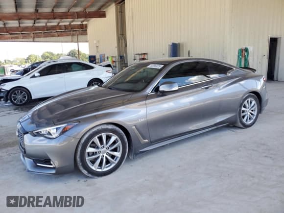 ✅ 2018 Infiniti Q60 Luxe • VIN: JN1EV7EK8JM342142 • Лот: 44695825. Опубликован ранее на Copart с пробегом 100 389 миль. Бесплатный доступ к архиву аукционных продаж из США и подробный отчёт об истории автомобиля на DreamBid. Изображение 1.