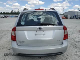 ✅ 2009 Kia Rondo LX • VIN: KNAFG528897229906 • Лот: 70821774. Опубликован ранее на Copart с пробегом 126 423 миль. Бесплатный доступ к архиву аукционных продаж из США и подробный отчёт об истории автомобиля на DreamBid. Изображение 6.
