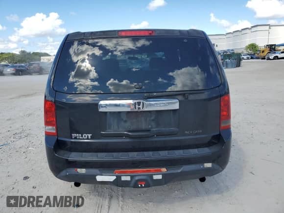 2013 Honda Pilot LX with VIN 5FNYF3H29DB041243, listed as a Copart auction lot 90041775 with 180,969 mi miles and Salvage title. Bid and sale history available at DreamBid. Image 6.