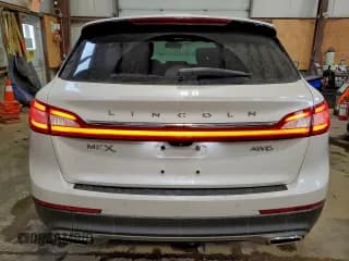 ✅ 2016 Lincoln MKX Reserve • VIN: 2LMPJ8LR9GBL31415 • Lot: 95065555. Wystawiony na Copart z przebiegiem 91 335 mil. Bezpłatny archiwum sprzedaży aukcyjnych z USA i szczegółowy raport historii pojazdu na DreamBid. Zdjęcie 6.