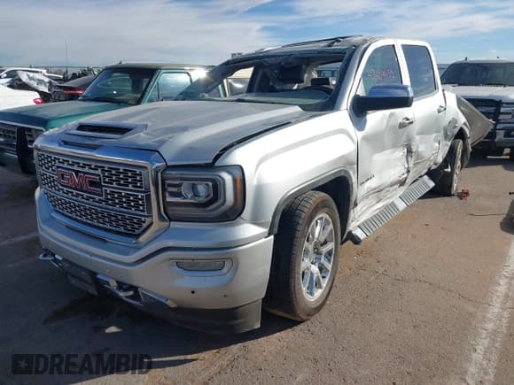 ✅ 2017 GMC Sierra 1500 Denali • VIN: 3GTU2PEC2HG437299 • Lot: 43609455. Listed on IAAI with Not provided. Free auction sales archive from the USA and detailed vehicle history report at DreamBid. Image 2.