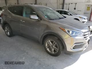 ✅ 2018 Hyundai Santa Fe 2.4L • VIN: 5NMZT3LB7JH085935 • Лот: 84585315. Опубликован ранее на Copart с пробегом 121 027 миль. Бесплатный доступ к архиву аукционных продаж из США и подробный отчёт об истории автомобиля на DreamBid. Изображение 4.