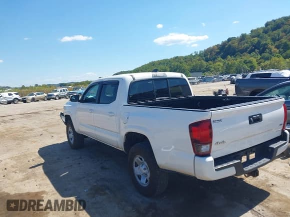 ✅ 2021 Toyota Tacoma SR • VIN: 3TYCZ5AN6MT030881 • Лот: 43217122. Опубликован ранее на IAAI с пробегом 100 699 миль. Бесплатный доступ к архиву аукционных продаж из США и подробный отчёт об истории автомобиля на DreamBid. Изображение 3.