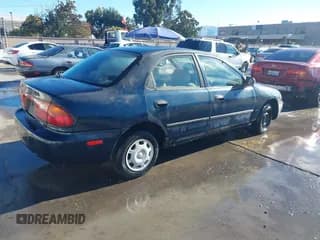 ✅ 1995 Mazda Protege • VIN: JM1BA1413S0152694 • Lot: 43767631. Wystawiony na IAAI z przebiegiem 138 365 mil. Bezpłatny archiwum sprzedaży aukcyjnych z USA i szczegółowy raport historii pojazdu na DreamBid. Zdjęcie 4.