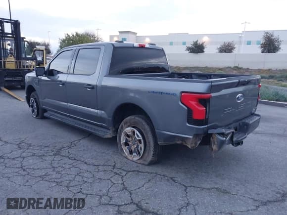 ✅ 2023 Ford F-150 Lightning Pro • VIN: 1FTVW1EL8PWG48559 • Лот: 41566599. Опубликован ранее на IAAI с пробегом 8 830 миль. Бесплатный доступ к архиву аукционных продаж из США и подробный отчёт об истории автомобиля на DreamBid. Изображение 3.