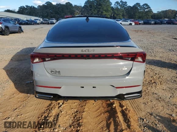 ✅ 2023 Kia K5 GT-Line • VIN: 5XXG64J27PG202430 • Лот: 92493655. Опубликован ранее на Copart с пробегом 31 772 миль. Бесплатный доступ к архиву аукционных продаж из США и подробный отчёт об истории автомобиля на DreamBid. Изображение 6.