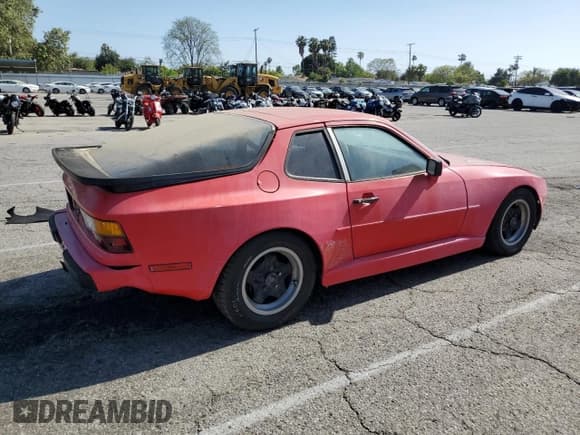 ✅ 1986 Porsche 944 • VIN: WP0AA0941GN458103 • Lot: 57688915. Wystawiony na Copart z przebiegiem 143 263 mil. Bezpłatny archiwum sprzedaży aukcyjnych z USA i szczegółowy raport historii pojazdu na DreamBid. Zdjęcie 3.