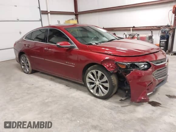 2018 Chevrolet Malibu Premier z VIN 1G1ZE5SX9JF103988, wystawiony jako IAAI lot #41557344 z przebiegiem 69 384 mil mil oraz . Historia ofert i sprzedaży dostępna na DreamBid. Obrazek 1.