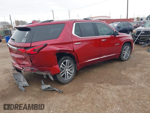 ✅ 2023 Chevrolet Traverse High Country • VIN: 1GNEVNKW7PJ221810 • Lot: 41215676. Wystawiony na IAAI z przebiegiem 26 020 mil. Bezpłatny archiwum sprzedaży aukcyjnych z USA i szczegółowy raport historii pojazdu na DreamBid. Zdjęcie 4.
