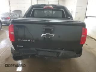✅ 2018 Chevrolet Colorado 4WD Z71 • VIN: 1GCGTDENXJ1270026 • Лот: 67765774. Опубликован ранее на Copart с пробегом 128 554 миль. Бесплатный доступ к архиву аукционных продаж из США и подробный отчёт об истории автомобиля на DreamBid. Изображение 6.