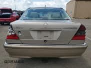 ✅ 2000 Mercedes-Benz C 230 Kompressor • VIN: WDBHA24G9YA806300 • Lot: 61999505. Wystawiony na Copart z przebiegiem 113 036 mil. Bezpłatny archiwum sprzedaży aukcyjnych z USA i szczegółowy raport historii pojazdu na DreamBid. Zdjęcie 6.