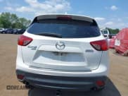 ✅ 2014 Mazda CX-5 Grand Touring • VIN: JM3KE4DY3E0351047 • Lot: 42802433. Wystawiony na IAAI z przebiegiem 61 544 mil. Bezpłatny archiwum sprzedaży aukcyjnych z USA i szczegółowy raport historii pojazdu na DreamBid. Zdjęcie 16.