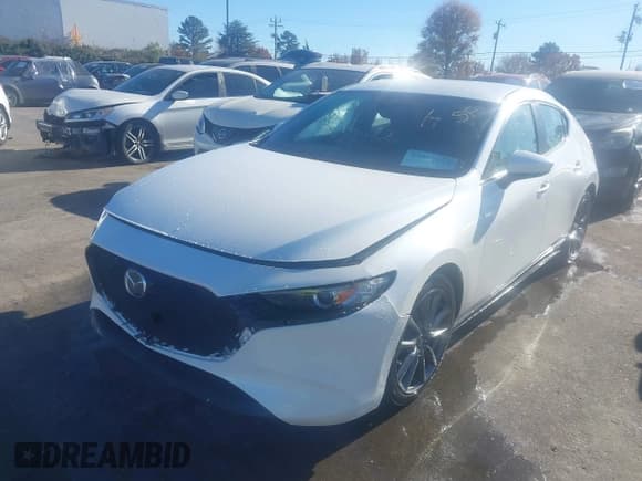✅ 2019 Mazda 3 • VIN: JM1BPAJM5K1141896 • Lot: 43667163. Listed on IAAI with 87,269 mi. Free auction sales archive from the USA and detailed vehicle history report at DreamBid. Image 2.