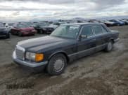 ✅ 1989 Mercedes-Benz 560 • VIN: WDBCA39E2KA467135 • Лот: 92134735. Опубликован ранее на Copart с пробегом 61 146 миль. Бесплатный доступ к архиву аукционных продаж из США и подробный отчёт об истории автомобиля на DreamBid. Изображение 1.