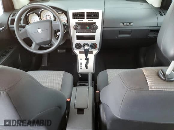 ✅ 2008 Dodge Caliber SXT • VIN: 1B3HB48B38D610457 • Лот: 87407074. Опубликован ранее на Copart с пробегом 139 515 миль. Бесплатный доступ к архиву аукционных продаж из США и подробный отчёт об истории автомобиля на DreamBid. Изображение 8.