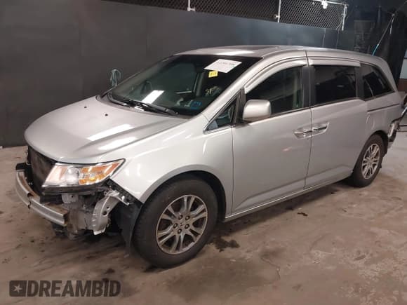 ✅ 2012 Honda Odyssey EX-L • VIN: 5FNRL5H67CB048962 • Lot: 42286708. Listed on IAAI with 131,403 mi. Free auction sales archive from the USA and detailed vehicle history report at DreamBid. Image 2.