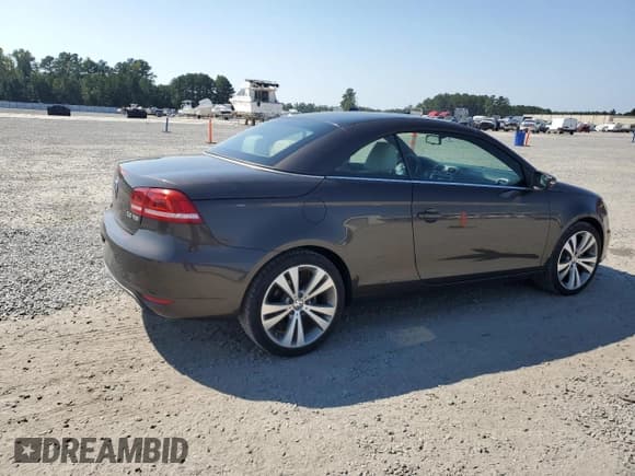 ✅ 2013 Volkswagen Eos Lux • VIN: WVWFW8AHXDV002312 • Lot: 74955834. Wystawiony na Copart z przebiegiem 79 974 mil. Bezpłatny archiwum sprzedaży aukcyjnych z USA i szczegółowy raport historii pojazdu na DreamBid. Zdjęcie 3.