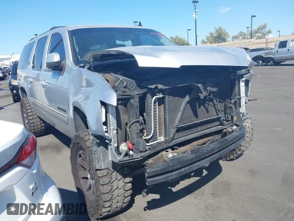 ✅ 2013 Chevrolet Suburban LS • VIN: 1GNSCHE02DR279905 • Lot: 43126475. Listed on IAAI with 126,441 mi. Free auction sales archive from the USA and detailed vehicle history report at DreamBid. Image 1.