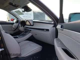 2023 Hyundai Palisade Calligraphy z VIN KM8R74GE6PU537689, wystawiony jako IAAI lot #41151656 z przebiegiem 23 392 mil mil oraz . Historia ofert i sprzedaży dostępna na DreamBid. Obrazek 5.