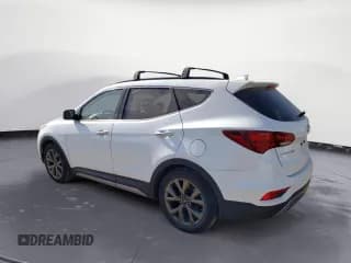 ✅ 2018 Hyundai Santa Fe Ultimate • VIN: 5NMZW4LA1JH076250 • Лот: 51115303. Опубликован ранее на Copart с пробегом 108 609 миль. Бесплатный доступ к архиву аукционных продаж из США и подробный отчёт об истории автомобиля на DreamBid. Изображение 2.