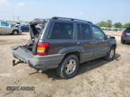 ✅ 2002 Jeep Grand Cherokee Laredo • VIN: 1J4GW48N62C194016 • Lot: 68567765. Listed on Copart with 102,767 mi. Free auction sales archive from the USA and detailed vehicle history report at DreamBid. Image 3.