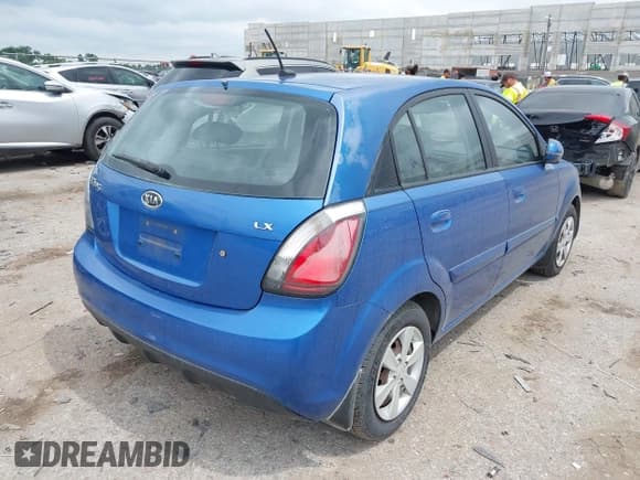 ✅ 2010 Kia Rio LX • VIN: KNADH5A31A6668353 • Lot: 42489422. Listed on IAAI with 149,361 mi. Free auction sales archive from the USA and detailed vehicle history report at DreamBid. Image 4.