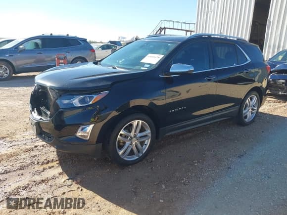 ✅ 2018 Chevrolet Equinox Premier • VIN: 2GNAXMEV2J6121057 • Lot: 43601678. Listed on IAAI with 115,263 mi. Free auction sales archive from the USA and detailed vehicle history report at DreamBid. Image 2.