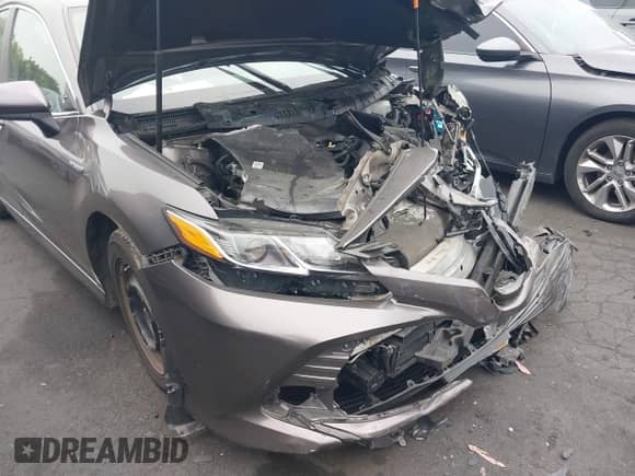 2020 Toyota Camry Hybrid LE z VIN 4T1C31AK6LU529780, wystawiony jako IAAI lot #42672539 z przebiegiem 60 540 mil mil oraz . Historia ofert i sprzedaży dostępna na DreamBid. Obrazek 19.