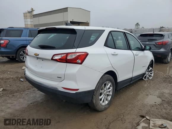 ✅ 2018 Chevrolet Equinox LS • VIN: 2GNAXREV0J6225799 • Lot: 90907535. Listed on Copart with 123,465 mi. Free auction sales archive from the USA and detailed vehicle history report at DreamBid. Image 3.
