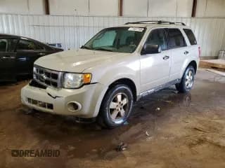 ✅ 2009 Ford Escape XLS • VIN: 1FMCU02759KC80393 • Lot: 71437795. Listed on Copart with 215,118 mi. Free auction sales archive from the USA and detailed vehicle history report at DreamBid. Image 1.