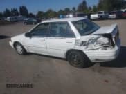 ✅ 1996 Ford Escort LX • VIN: 3FASP13J6TR107918 • Лот: 83764575. Опубликован ранее на Copart с пробегом 100 131 миль. Бесплатный доступ к архиву аукционных продаж из США и подробный отчёт об истории автомобиля на DreamBid. Изображение 2.