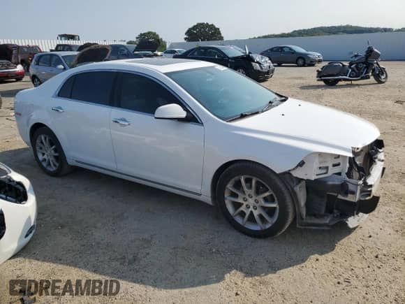 2012 Chevrolet Malibu LTZ with VIN 1G1ZG5E74CF328974, listed as a Copart auction lot 70752244 with 153,706 mi miles and Non repairable. Bid and sale history available at DreamBid. Image 4.