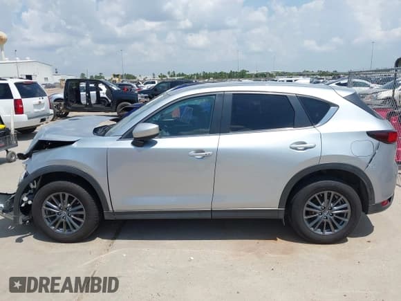 ✅ 2020 Mazda CX-5 Touring • VIN: JM3KFBCM9L0787379 • Lot: 42948238. Wystawiony na IAAI z przebiegiem 190 399 mil. Bezpłatny archiwum sprzedaży aukcyjnych z USA i szczegółowy raport historii pojazdu na DreamBid. Zdjęcie 15.