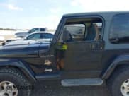 ✅ 2002 Jeep Wrangler Sahara • VIN: 1J4FA59S62P756767 • Lot: 43730556. Listed on IAAI with 145,681 mi. Free auction sales archive from the USA and detailed vehicle history report at DreamBid. Image 15.