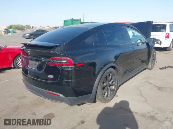 ✅ 2022 Tesla Model X Plaid • VIN: 7SAXCBE60NF350917 • Лот: 41288682. Опубликован ранее на IAAI с пробегом Не указан. Бесплатный доступ к архиву аукционных продаж из США и подробный отчёт об истории автомобиля на DreamBid. Изображение 4.