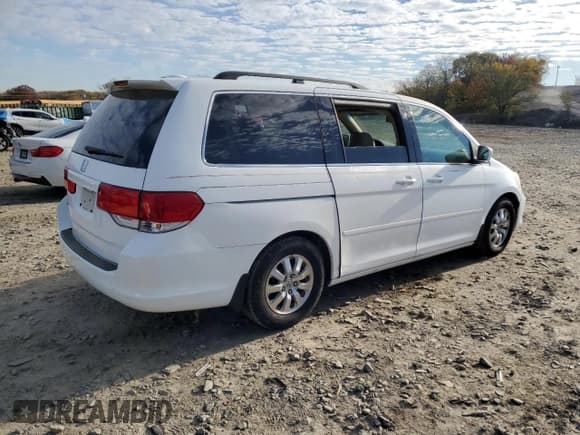 ✅ 2008 Honda Odyssey EX-L • VIN: 5FNRL38608B402266 • Лот: 91518905. Опубликован ранее на Copart с пробегом 151 838 миль. Бесплатный доступ к архиву аукционных продаж из США и подробный отчёт об истории автомобиля на DreamBid. Изображение 3.