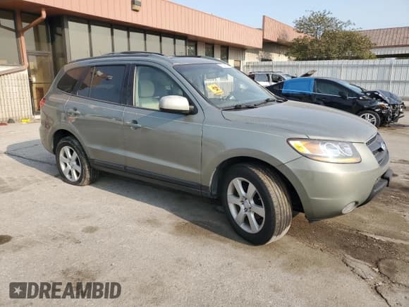 ✅ 2007 Hyundai Santa Fe SE • VIN: 5NMSH13E67H077335 • Lot: 70749084. Listed on Copart with 180,063 mi. Free auction sales archive from the USA and detailed vehicle history report at DreamBid. Image 4.