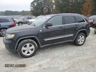 ✅ 2011 Jeep Grand Cherokee Laredo • VIN: 1J4RR4GTXBC597139 • Lot: 93514295. Listed on Copart with 84,916 mi. Free auction sales archive from the USA and detailed vehicle history report at DreamBid. Image 1.